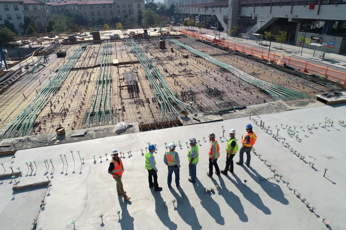 Wilson Way construction crew reviewing plans at a Louisville KY job site